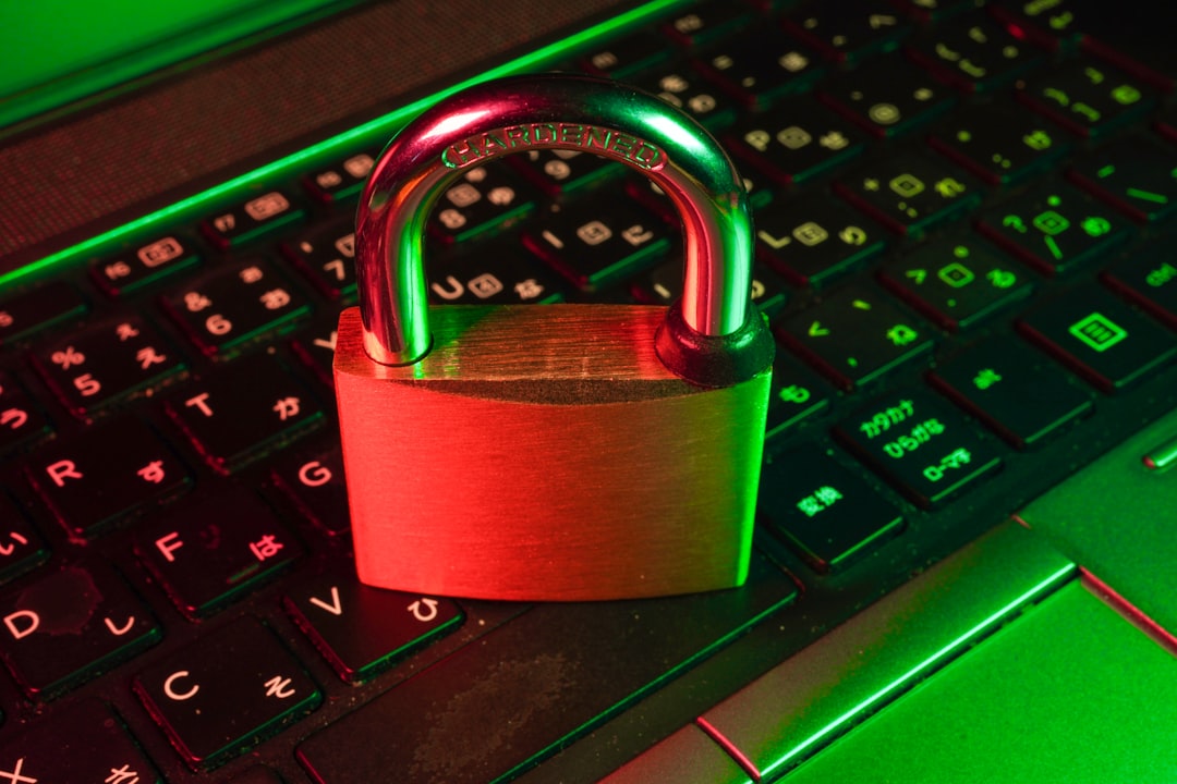 Small business owner reviewing a cyber insurance policy on a laptop