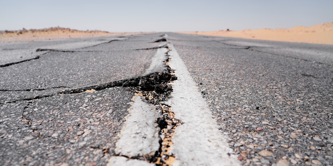 Cracked residential home foundation showing severe earthquake structural damage