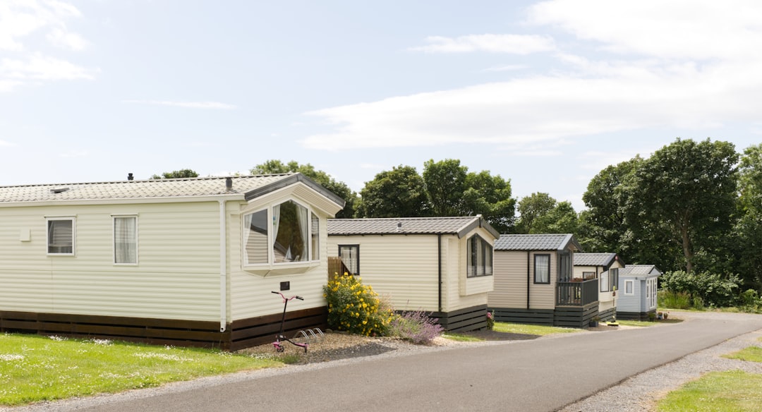 Mobile home park with manufactured homes, insurance concept illustration